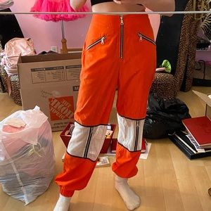 I AM GIA orange pants with white mesh and zip